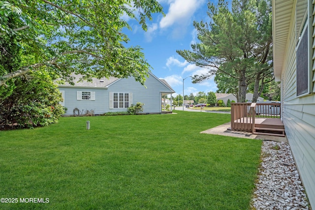 46 Carmacks Way, Toms River, NJ 08757 - view of grassy yard featuring a deck