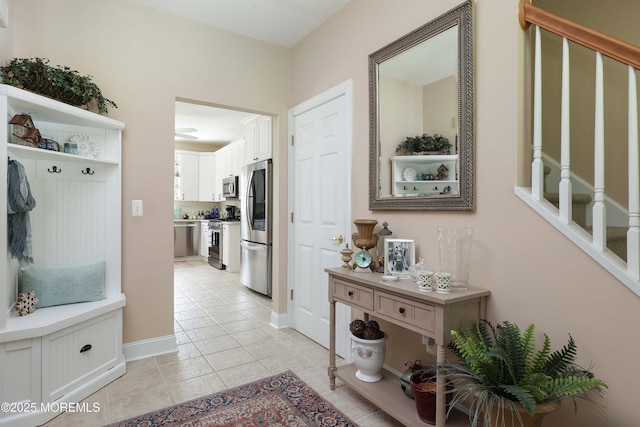 8001/2 Schoolhouse Rd, Brielle, NJ 08730 - mudroom with light tile patterned floors and baseboards