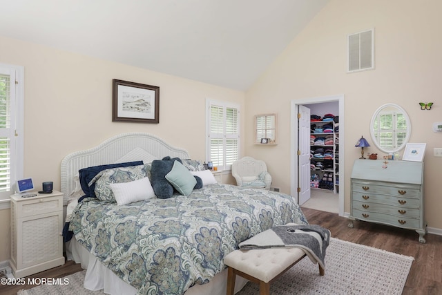 8001/2 Schoolhouse Rd, Brielle, NJ 08730 - bedroom with a walk in closet, wood finished floors, a closet, and high vaulted ceiling