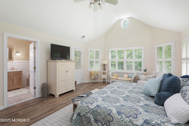 8001/2 Schoolhouse Rd, Brielle, NJ 08730 - bedroom with wood finished floors, multiple windows, ensuite bath, high vaulted ceiling, and a ceiling fan