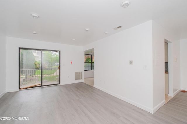 402 Hidden Village Dr Unit 402, Perth Amboy, NJ 08862 - spare room with light wood-style flooring