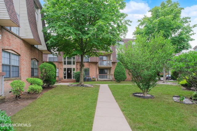 402 Hidden Village Dr Unit 402, Perth Amboy, NJ 08862 - view of home's community featuring a yard