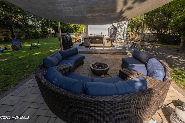 605 Ocean Gate Ave, Ocean Gate, NJ 08740 - fenced backyard featuring an outdoor living space, a patio area, a hot tub, and a grill