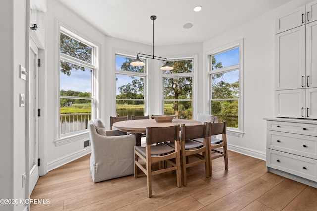 199-203 Lake Ave, Island Heights, NJ 08732 - dining room featuring light wood-style floors, a water view, and recessed lighting