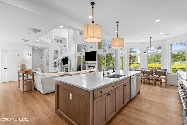 199-203 Lake Ave, Island Heights, NJ 08732 - kitchen featuring dishwasher, light wood-style floors, recessed lighting, light countertops, and open floor plan