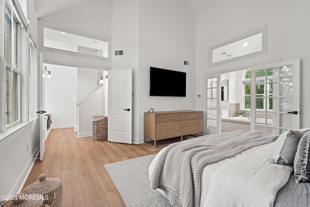 199-203 Lake Ave, Island Heights, NJ 08732 - bedroom featuring high vaulted ceiling and light wood-style floors