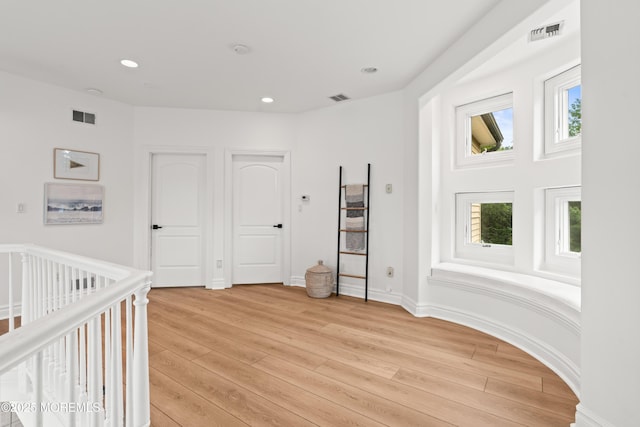 199-203 Lake Ave, Island Heights, NJ 08732 - unfurnished bedroom with light wood-style flooring, recessed lighting, and a crib