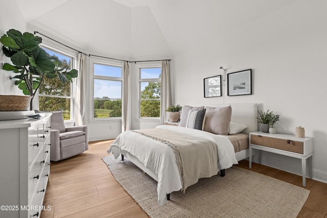 199-203 Lake Ave, Island Heights, NJ 08732 - bedroom featuring light wood finished floors and high vaulted ceiling