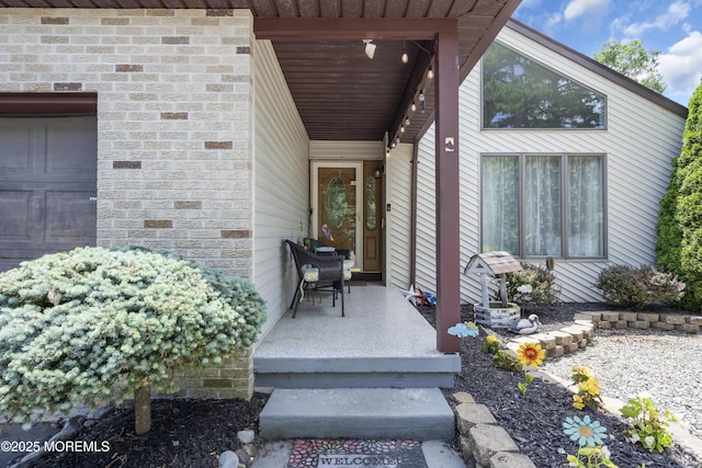 993 Sandy Cir, Manahawkin, NJ 08050 - view of exterior entry with a garage and stone siding