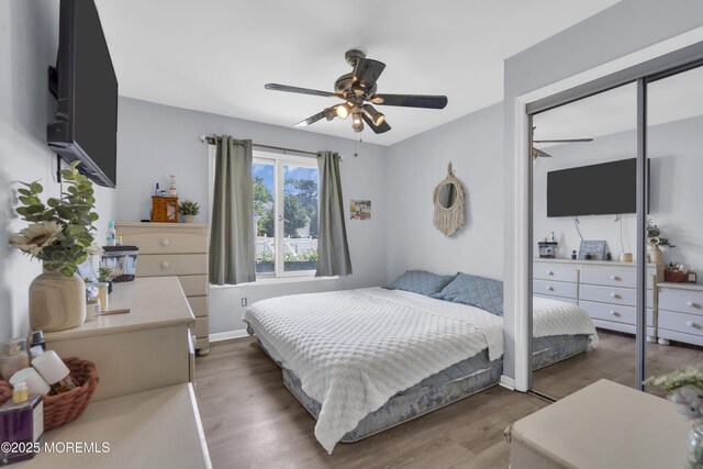 993 Sandy Cir, Manahawkin, NJ 08050 - bedroom featuring wood finished floors, ceiling fan, and a closet