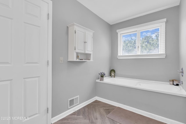 993 Sandy Cir, Manahawkin, NJ 08050 - bathroom featuring baseboards and a garden tub