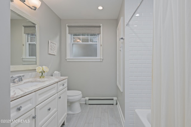 79 Lake Shore Dr, Red Bank, NJ 07701 - bathroom with a baseboard radiator, vanity, shower / tub combo, wood finished floors, and recessed lighting