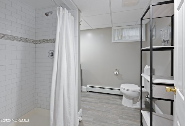 79 Lake Shore Dr, Red Bank, NJ 07701 - full bathroom with baseboard heating, a stall shower, wood finished floors, and vanity