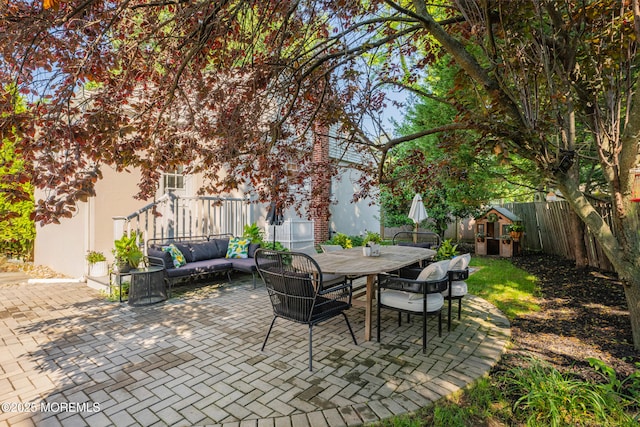 79 Lake Shore Dr, Red Bank, NJ 07701 - fenced backyard featuring a patio area, outdoor lounge area, and outdoor dining space
