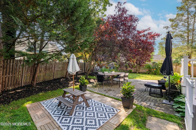 79 Lake Shore Dr, Red Bank, NJ 07701 - fenced backyard featuring outdoor dining area and a patio area