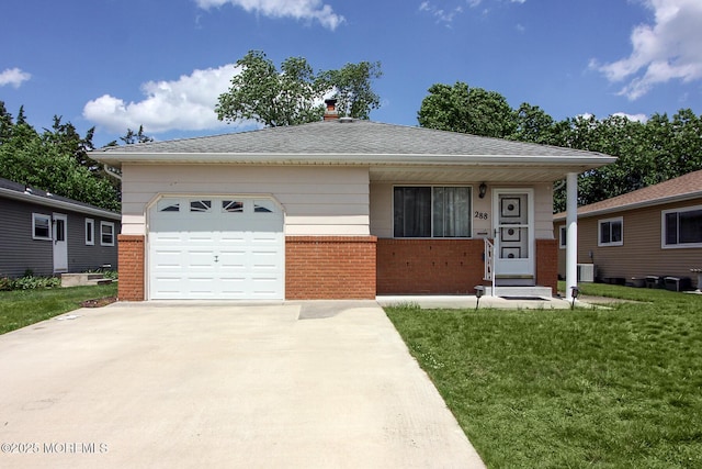 288 Barbados Dr N, Toms River, NJ 08757 - view of front facade featuring concrete driveway, brick siding, an attached garage, and a front lawn