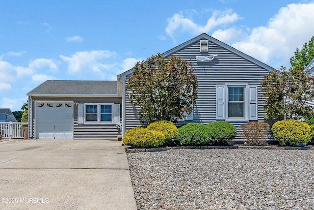 82 Spinnaker Ct, Bayville, NJ 08721 - view of front facade with concrete driveway and an attached garage