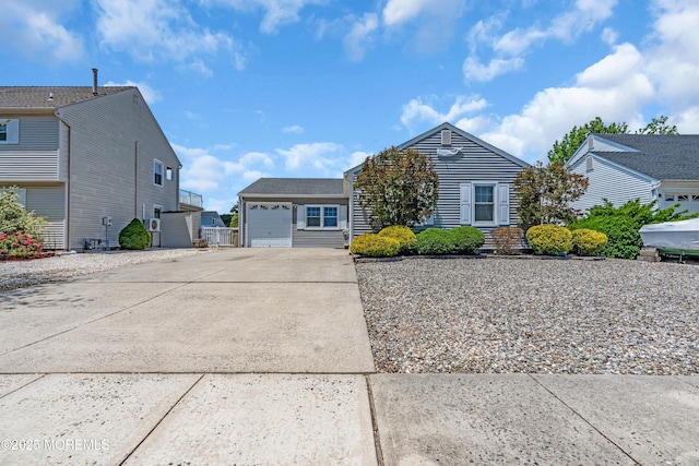 82 Spinnaker Ct, Bayville, NJ 08721 - view of front of property with concrete driveway and an attached garage