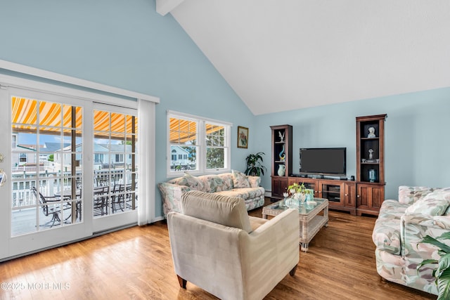 82 Spinnaker Ct, Bayville, NJ 08721 - living area featuring high vaulted ceiling, wood finished floors, and beamed ceiling