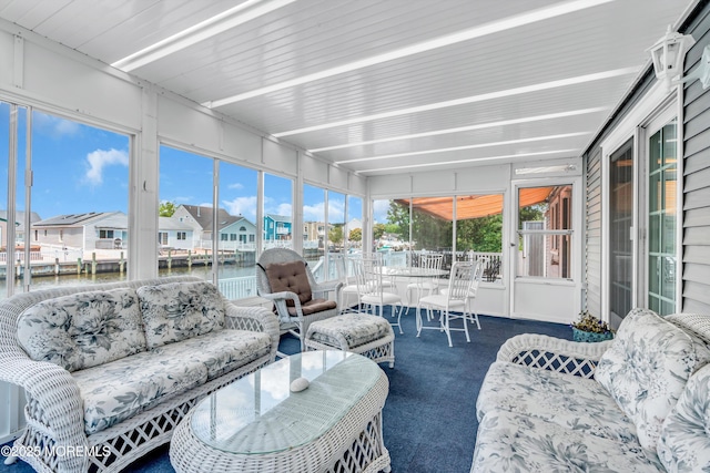 82 Spinnaker Ct, Bayville, NJ 08721 - sunroom with a water view, an outdoor hangout area, a residential view, and outdoor dining space