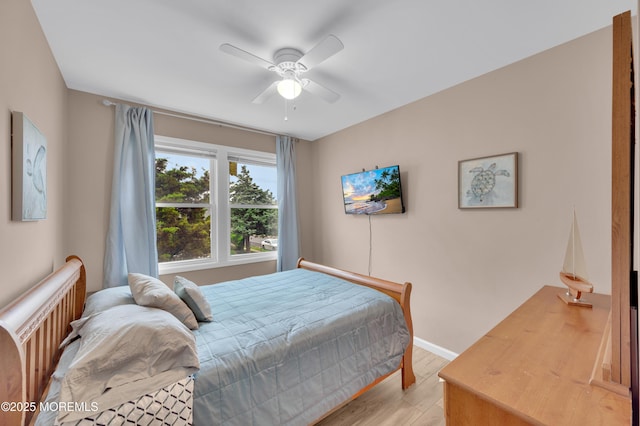 241 Hiering Ave, Seaside Heights, NJ 08751 - bedroom with light wood-style flooring and a ceiling fan