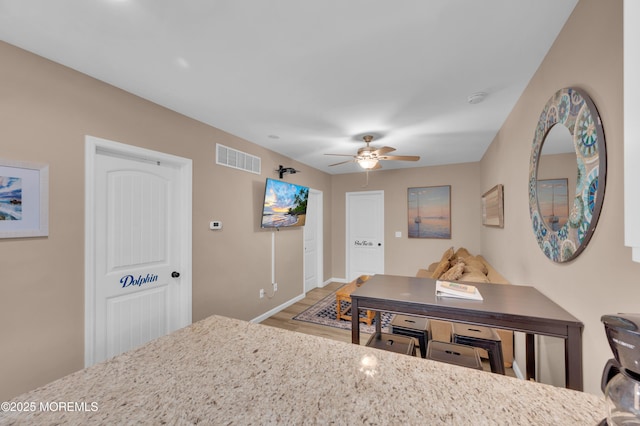 241 Hiering Ave, Seaside Heights, NJ 08751 - kitchen with wood finished floors and ceiling fan