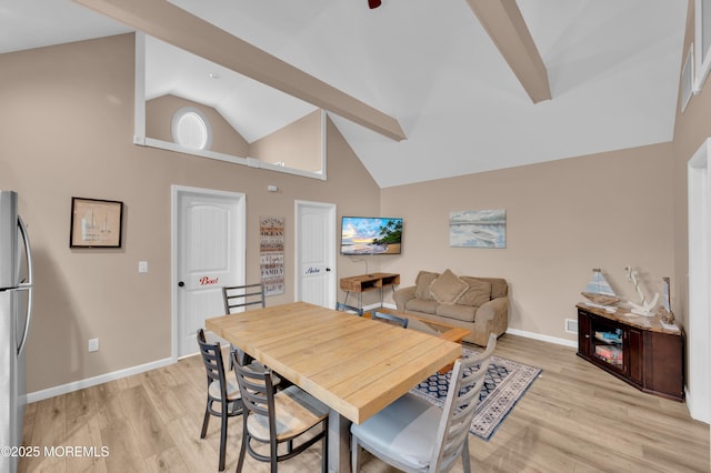 241 Hiering Ave, Seaside Heights, NJ 08751 - dining space with high vaulted ceiling and light wood-style floors