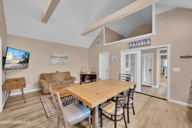 241 Hiering Ave, Seaside Heights, NJ 08751 - dining area with high vaulted ceiling, light wood finished floors, french doors, and beamed ceiling