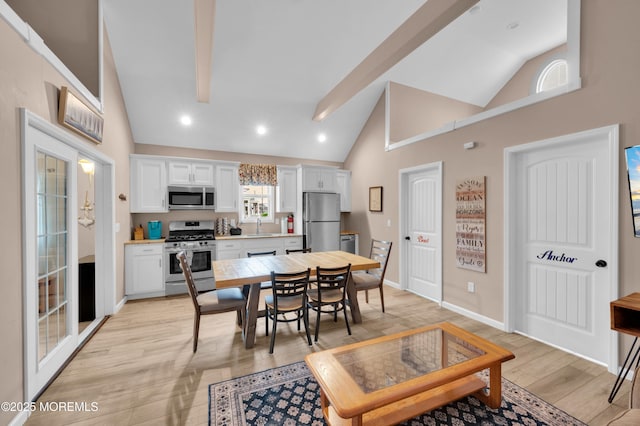 241 Hiering Ave, Seaside Heights, NJ 08751 - dining room with high vaulted ceiling, light wood-style flooring, and recessed lighting