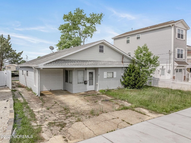 11 W Thames Rd, Little Egg Harbor, NJ 08087 - view of front of house featuring an attached garage, driveway, and a shingled roof
