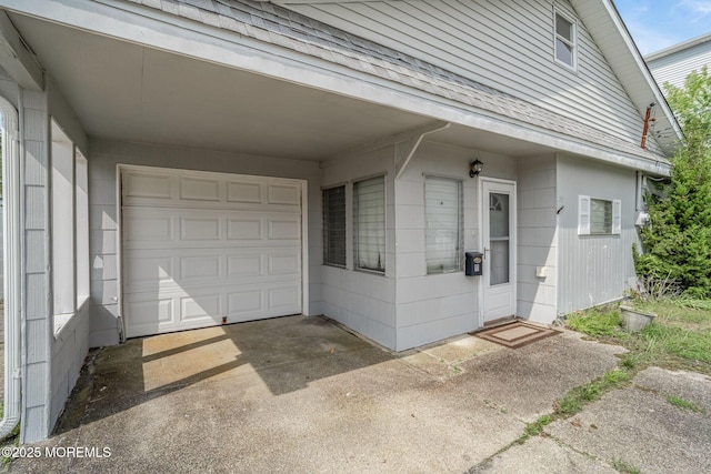11 W Thames Rd, Little Egg Harbor, NJ 08087 - garage featuring a carport and concrete driveway