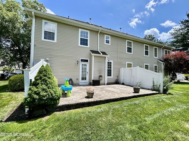 205 Shinnecock Dr, Manalapan, NJ 07726 - rear view of property featuring a patio area