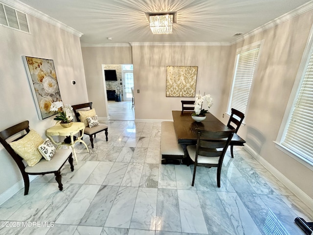 205 Shinnecock Dr, Manalapan, NJ 07726 - dining space with light marble finish flooring and crown molding