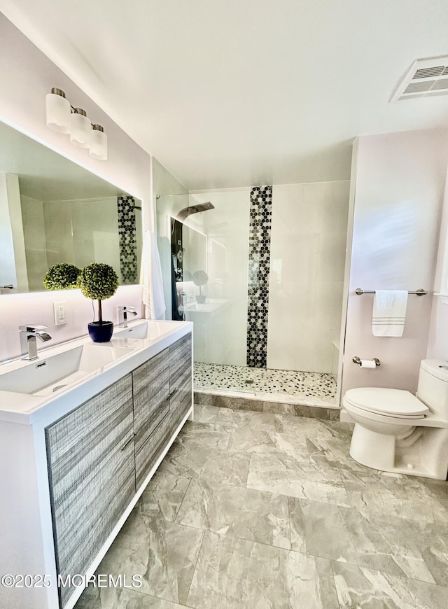 205 Shinnecock Dr, Manalapan, NJ 07726 - bathroom featuring a walk in shower, double vanity, and marble finish floors