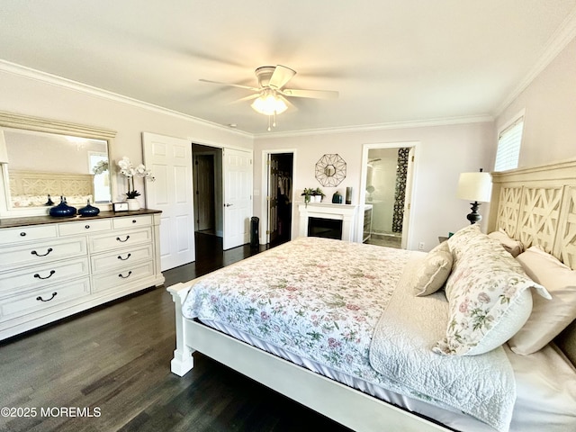 205 Shinnecock Dr, Manalapan, NJ 07726 - bedroom featuring ornamental molding, dark wood finished floors, ceiling fan, ensuite bathroom, and a closet