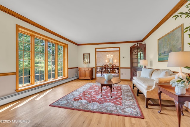 22 Hunt Rd, Freehold, NJ 07728 - living area featuring baseboard heating, a chandelier, light wood-type flooring, and ornamental molding