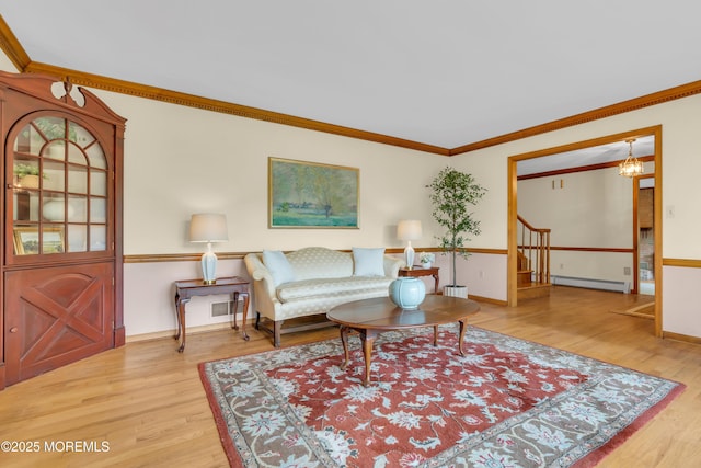 22 Hunt Rd, Freehold, NJ 07728 - living area featuring ornamental molding, wood finished floors, stairway, and baseboard heating