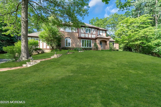 22 Hunt Rd, Freehold, NJ 07728 - tudor home with a front yard and brick siding