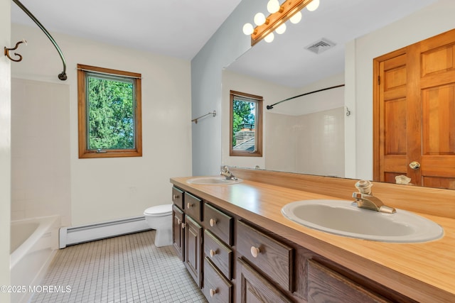 22 Hunt Rd, Freehold, NJ 07728 - full bath with baseboard heating, double vanity, plenty of natural light, and tile patterned floors