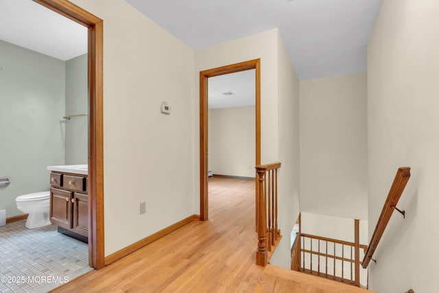 22 Hunt Rd, Freehold, NJ 07728 - stairs featuring baseboards and wood finished floors
