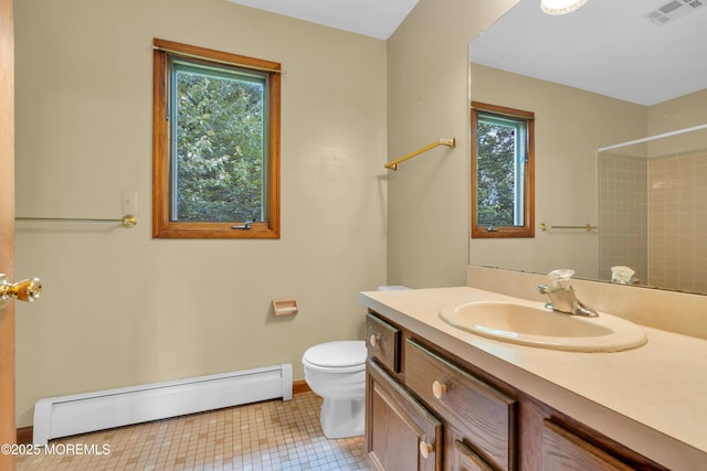 22 Hunt Rd, Freehold, NJ 07728 - bathroom with a baseboard heating unit, vanity, a shower, and tile patterned floors