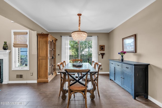 134 Marina Bay Ct, Highlands, NJ 07732 - dining room featuring a chandelier and crown molding