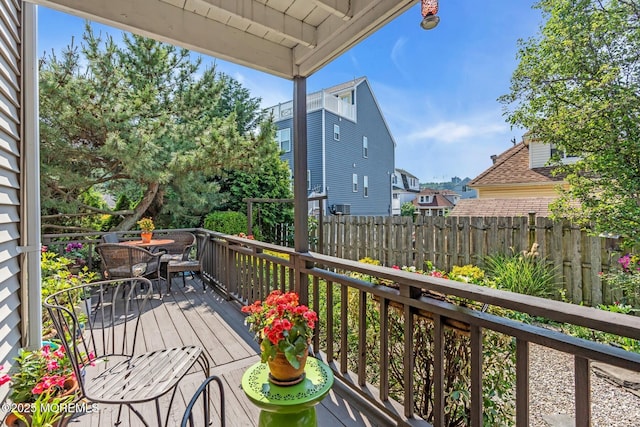 134 Marina Bay Ct, Highlands, NJ 07732 - view of wooden balcony with a deck, outdoor dining area, and a residential view