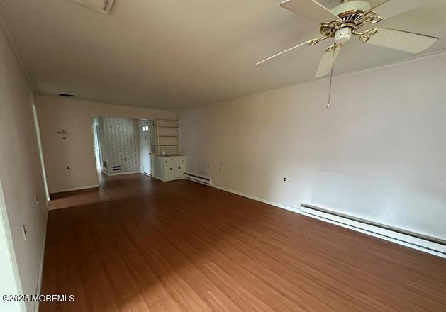 10 Arnold St, Brick, NJ 08724 - empty room featuring a ceiling fan, wood finished floors, and baseboard heating