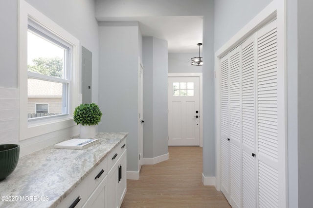 623 Central Ave, Union Beach, NJ 07735 - hall with light wood finished floors and electric panel