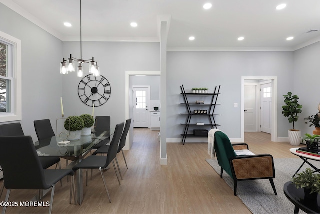 623 Central Ave, Union Beach, NJ 07735 - dining room with light wood finished floors, crown molding, recessed lighting, and a chandelier