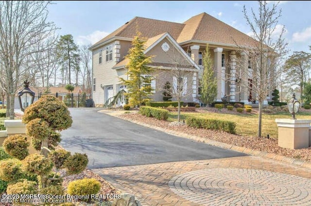 6 Meadow Run Ct, Jackson, NJ 08527 - view of front of property featuring curved driveway and an attached garage