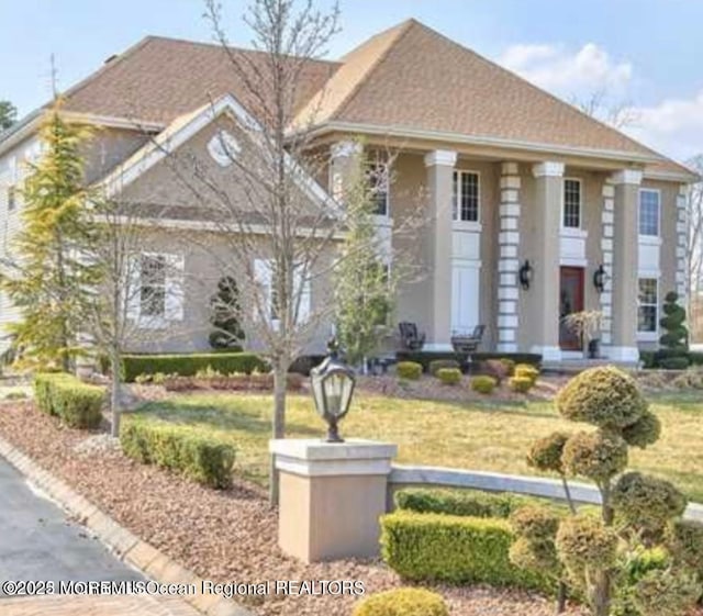 6 Meadow Run Ct, Jackson, NJ 08527 - neoclassical home with a front lawn