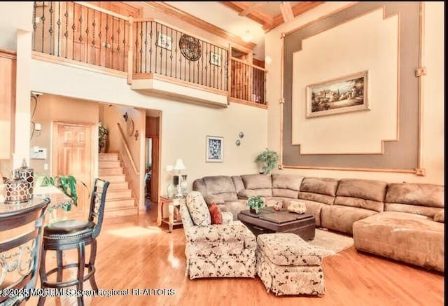 6 Meadow Run Ct, Jackson, NJ 08527 - living area featuring wood finished floors, stairway, and a towering ceiling