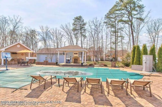 6 Meadow Run Ct, Jackson, NJ 08527 - community pool featuring a patio and an outbuilding